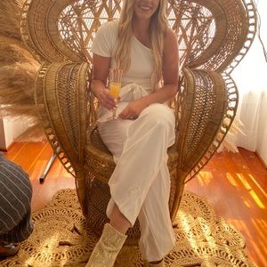 White one shoulder jumpsuit. Very stretchy and comfortable. Thick material.